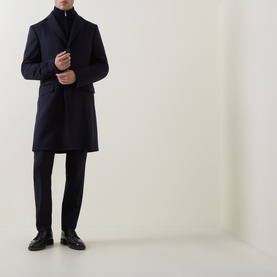 Model wearing Zegna navy blue wool cashmere coat, styled with matching navy trousers and black leather shoes