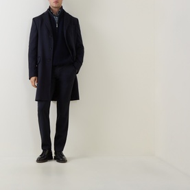 Model wearing Zegna navy blue wool cashmere coat, styled with dark trousers and black leather shoes, mid-length silhouette