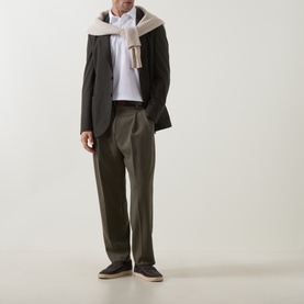 Model wearing Zegna white cotton polo with dark blazer, olive trousers, beige scarf and dark loafers