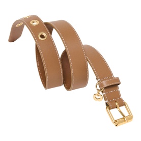 Maje brown leather belt with gold-tone buckle, stud detailing, white contrast stitching, and charm pendant, coiled to show full length.