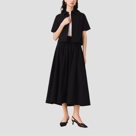 Model wearing Maje Womens French Dress in red, styled with black slingback heels