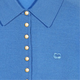 Maje blue fine knit polo top with gold snap buttons and embroidered heart logo detail at chest