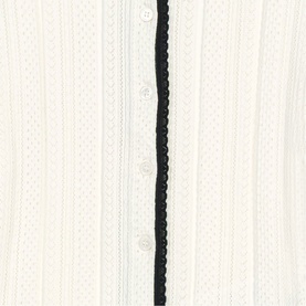 Maje white knit top with textured stripe detailing and black braided trim along button placket, close-up detail view