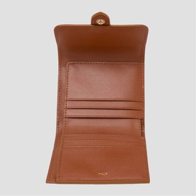 Maje tan leather small wallet open, showing card slots and inner compartment with gold-tone button closure.
