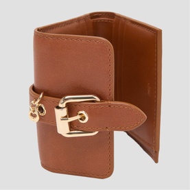 Maje tan leather compact wallet with gold-tone buckle strap detail, card slots visible, tri-fold style