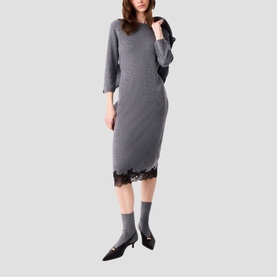 Model wearing Maje Womens French Dress in red, styled with grey knit socks and black kitten heel mules, featuring lace hem trim.