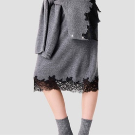 Model wearing Maje Womens French Dress in grey knit with black lace hem trim, styled with matching grey knit top and grey ribbed socks