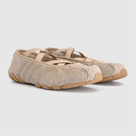 Adidas ballet-style flat in Magic Beige suede with crossover elasticated strap and tan rubber sole, pair shown