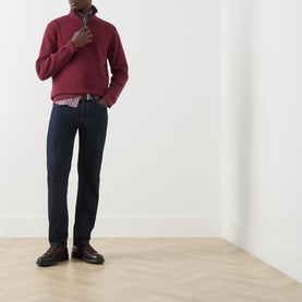 Model wearing Gant Deep Grape Wine cotton sweatshirt with half-zip, styled with dark navy jeans and brown leather shoes.