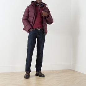 Model wearing Gant Deep Grape Wine cotton sweatshirt, styled with burgundy puffer jacket, dark jeans, and brown boots.
