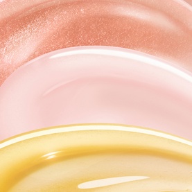Gisou make-up gift set texture swatches in rose gold, soft pink, and golden yellow shades