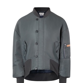 JW Anderson dark grey nylon bomber jacket with button front, ribbed collar and cuffs, and zip sleeve pocket