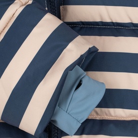 Konges Sl&oslash;jd coat in Bleu Noir stripe, close-up of navy and cream bold stripes with blue cuff detail and zip fastening.