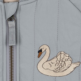 Konges Sl&oslash;jd light blue children's jacket close-up showing embroidered swan motif and gold zip detail