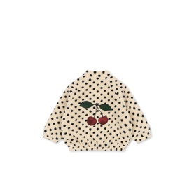 Konges Sl&oslash;jd children's outerwear in Dot Lumiere, cream with black polka dots and embroidered cherry motif on chest