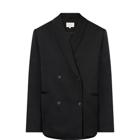 Loulou Studio black double-breasted blazer with notch lapels, welt pockets, and button fastening, in viscose-wool blend