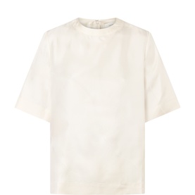 Loulou Studio ivory silk T-shirt with crew neck, short sleeves, and relaxed fit, shown flat on white background.