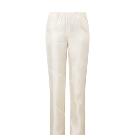 Loulou Studio ivory silk trousers with elasticated waist, straight-leg cut and subtle sheen finish