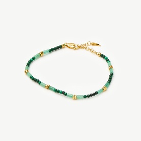 Missoma Gold Green beaded bracelet with mixed green stones, gold cylindrical beads, and lobster clasp chain extender
