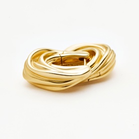 Missoma gold interlocking knot hoop earring, polished finish, shown as single piece