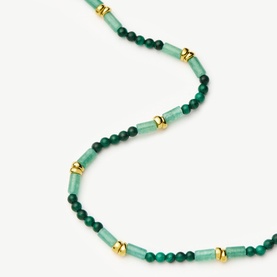 Missoma gold green beaded necklace with cylindrical green stones, round dark green beads and gold rondelle spacers