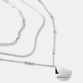 Silver-tone layered necklace set with heart pendant and satellite chain detailing