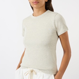 Model wearing Soeur charcoal cotton T-shirt with crew neck and short sleeves, styled with white drawstring trousers