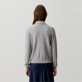 Model wearing Claude Pierlot Fine Knit Cardigan in mottled grey, long-sleeve with shirt collar, styled with navy midi skirt, rear view