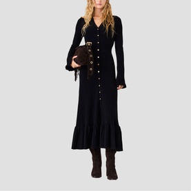 Model wearing Maje Womens French Dress in red, styled with brown knee-high boots and carrying a small brown fur clutch bag