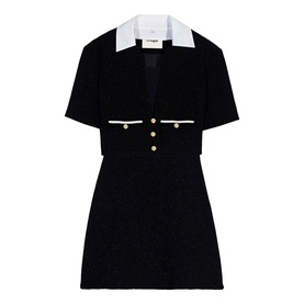 Black tweed mini dress with white contrast collar, chest pockets, and gold button detail