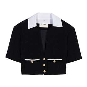 Black cropped tweed jacket with white contrast collar, short sleeves, and gold button fastening