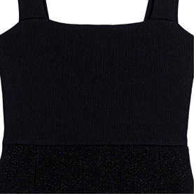 Black ribbed knit dress with square neckline and wide straps, featuring a sparkle embellished skirt panel at the hem