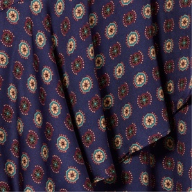 Claude Pierlot Womens French Dress in navy print, close-up of medallion floral pattern fabric detail in red, green and cream tones.