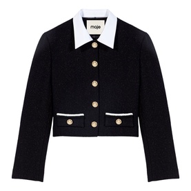 Maje cropped jacket in black with white contrast collar, gold button detailing, and white-trimmed pockets