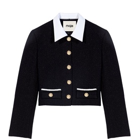 Maje cropped jacket in black with white contrast collar, gold button detailing, and white-trimmed pockets