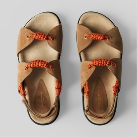 Claude Pierlot brown suede sandals with orange woven rope strap detailing and cross-front design, overhead flat lay view.