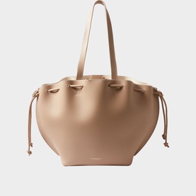 Claude Pierlot tote bag in clear beige smooth leather with gold-tone drawstring details and long shoulder straps