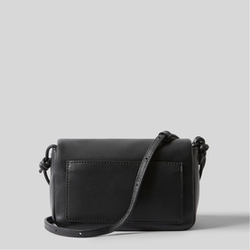 Black smooth leather crossbody bag, back view, with adjustable narrow strap and clean structured silhouette, gunmetal hardware detail