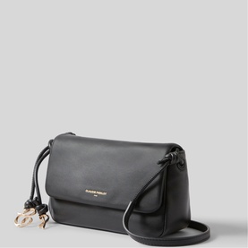Black crossbody bag with flap closure, gold-tone logo charm and hardware, slim adjustable shoulder strap