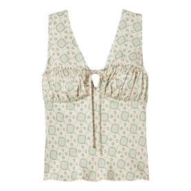 Cream sleeveless top with green geometric floral print, ruched bust detail, tie-front fastening, and V-neckline