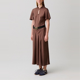 Model wearing Claude Pierlot Womens French Dress in Brown Ice, styled with a black belt and blue flat sandals.