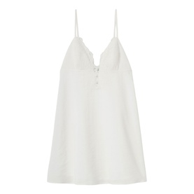 White slip camisole top with V-neckline, button detail, and thin adjustable straps, laid flat on white background