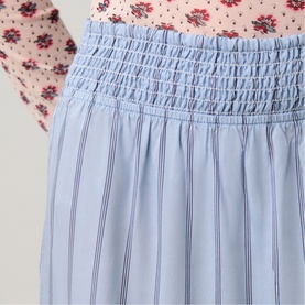 Light blue striped midi skirt with smocked elasticated waistband, shown with floral top styling detail