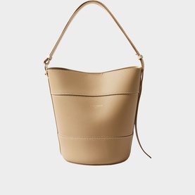 Claude Pierlot bucket bag in clear beige smooth leather, gold-tone hardware, single top handle and tassel detail