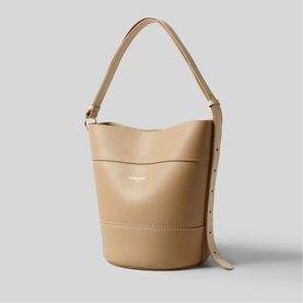 Claude Pierlot bucket bag in beige smooth leather, gold-tone hardware, single top handle and stud detailing on side