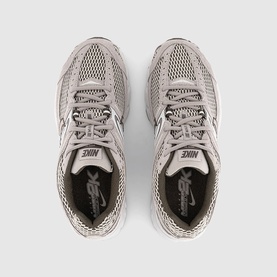 Nike Zoom Vomero 5 trainers in College Grey, overhead view showing mesh upper, lace-up front and branded insole