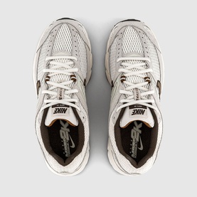 Nike trainer in Phantom Tan Sail Baroque, overhead flat lay showing white mesh upper, tan sockliner and dark brown branding details.
