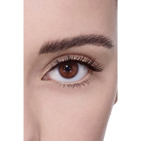Model with Chanel 3-In-1 Eyeshadow-Eyeliner-Kohl Pencil in Baby Yellow, shown on eye with defined lashes and brow