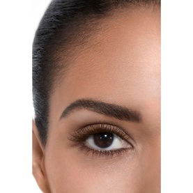 Close-up of model's eye showcasing Chanel All-In-One Mascara Volume, Length, Curl And Definition with defined, voluminous lashes