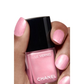 Chanel Le Vernis Longwear Nail Colour in Party Girl, sheer pink shimmer varnish, shown on hand with painted nails